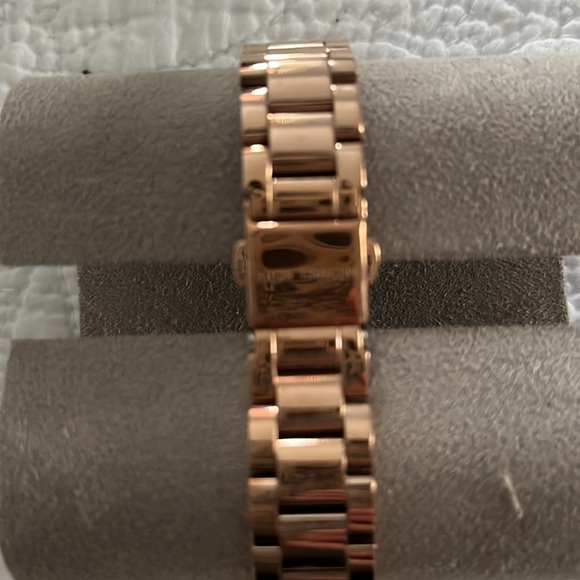 Brand new Michael Kors watch. Has never been worn, and is in perfect condition.